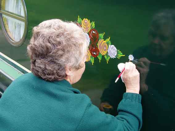 TRINA PAINTING DAISIES